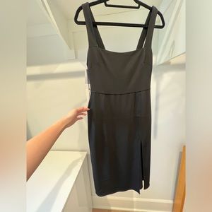 Brand new Aritzia 90’s slit dress in black